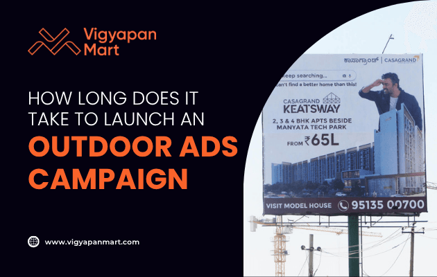 A large outdoor billboard advertising apartments is shown beside a road. The text asks, How long does it take to launch an outdoor ads campaign? and features the Vigyapan Mart logo and contact details.