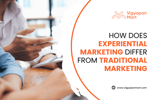 Two people in a meeting, one writing on paper, with the text How does experiential marketing differ from traditional marketing? and the Vigyapan Mart logo and website on the right side.