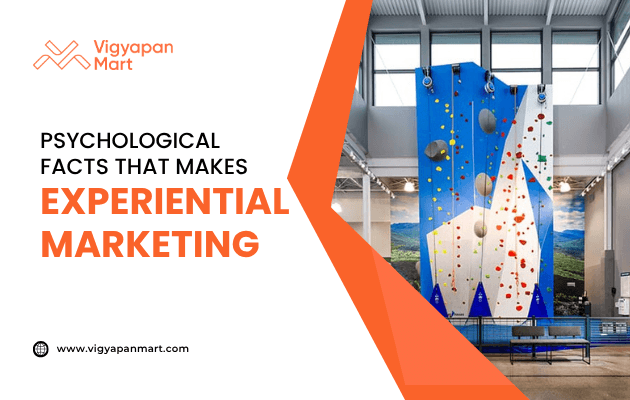 Promotional graphic for Vigyapan Mart showing a colorful indoor climbing wall and text reading Psychological facts that makes experiential marketing. Website link appears at the bottom.