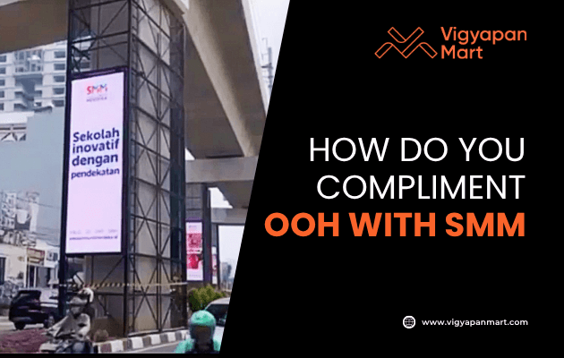 Roadside digital billboard in a city with Indonesian ad text, alongside Vigyapan Mart graphic reading "How do you compliment OOH with SMM" and website link.
