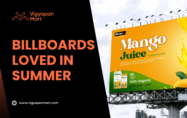 Bright outdoor billboard advertising Mango Juice with bold yellow and green design, fruit splash imagery, and “100% Organic” label. Overlay text reads “Billboards Loved in Summer” with Vigyapan Mart branding, highlighting seasonal billboard advertising appeal.