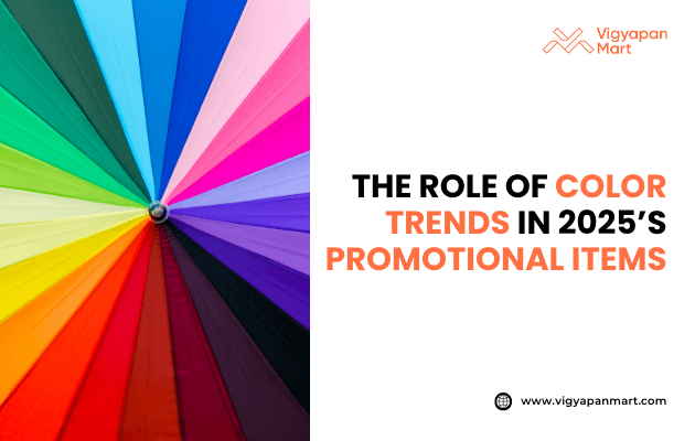 Vigyapan Mart creative showing a colorful umbrella fan spread with multiple vibrant shades. Text overlay reads “The Role of Color Trends in 2025’s Promotional Items.