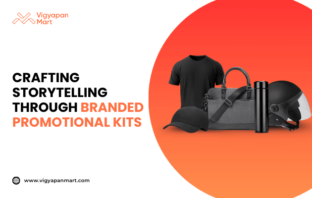 Branded promotional kit display featuring black t-shirt, cap, duffel bag, insulated bottle, and helmet on gradient orange background. Marketing banner text reads 'Crafting Storytelling Through Branded Promotional Kits' by Vigyapan Mart, emphasizing brand identity through customized merchandise.