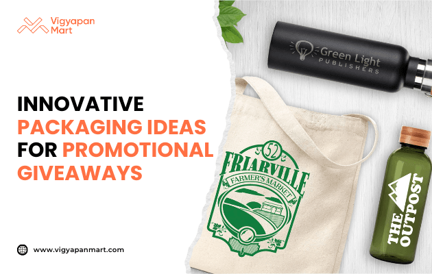 Promotional giveaway items including black stainless steel bottle with 'Green Light Publishers' logo, beige tote bag with 'Briarville Farmers Market' print, and green water bottle with 'The Outpost' branding. Marketing banner text reads 'Innovative Packaging Ideas for Promotional Giveaways' by Vigyapan Mart, highlighting creative branded merchandise.