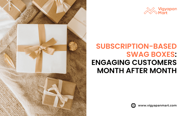 Flat lay of wrapped gift boxes in white and brown paper with ribbons on a soft fabric surface, alongside text “Subscription-Based Swag Boxes: Engaging Customers Month After Month,” with Vigyapan Mart logo and website.