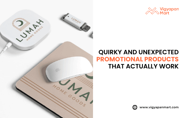 Branded promotional products including a wireless charger, USB drive, and mouse pad with “Lumah Home Goods” logo, next to text “Quirky and Unexpected Promotional Products That Actually Work,” featuring Vigyapan Mart logo and website.