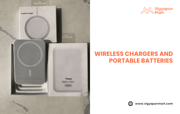 Wireless chargers and portable battery packs in white MagSafe packaging displayed on a marble surface. Text reads “Wireless chargers and portable batteries” with Vigyapan Mart logo. Tech accessories for modern promotional campaigns and corporate gifting.