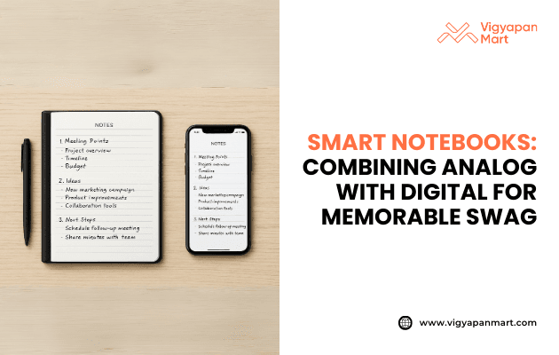 Smart notebook and smartphone placed side by side on a wooden desk, both displaying identical handwritten meeting notes, showing analog-to-digital syncing. Text reads: “Smart notebooks: Combining analog with digital for memorable swag” with Vigyapan Mart logo. Innovative promotional product for corporate gifting.