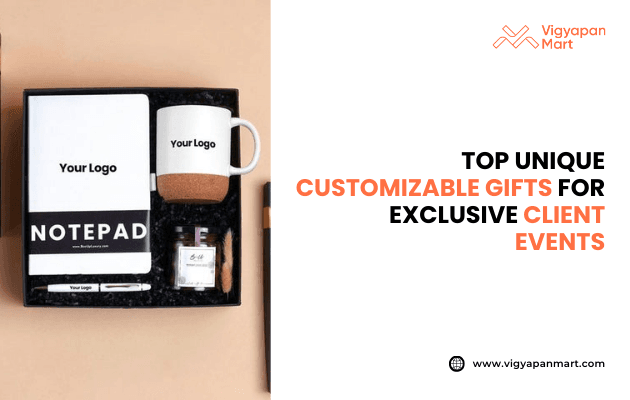 Gift box containing customizable corporate gifts including a notepad, branded mug, pen, candle, and small accessories with “Your Logo” placeholders. Text reads: “Top unique customizable gifts for exclusive client events” with Vigyapan Mart logo. Premium corporate gifting and event merchandise concept.