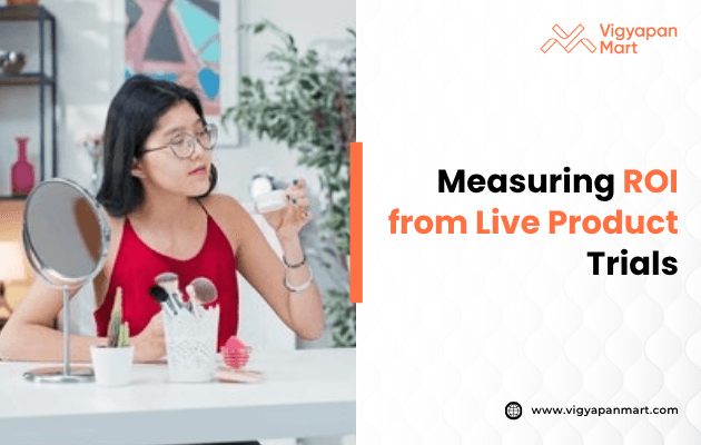 A woman in a red top applies makeup at a table with a mirror and brushes. Text reads "Measuring ROI from Live Product Trials" by Vigyapan Mart.