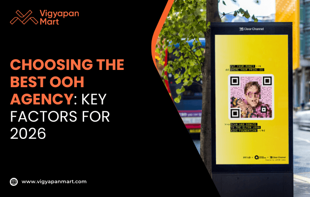 Outdoor advertisement featuring bold text “Choosing the Best OOH Agency: Key Factors for 2026” beside a yellow poster with a QR code and pixelated image, set against green foliage and a red vehicle in the background.