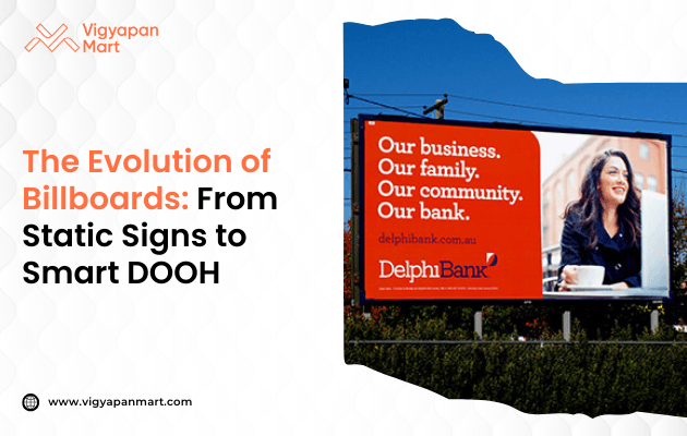 A professional billboard shows a smiling woman with the message “Our business. Our family. Our community. Our bank.” promoting Delphi Bank. The title reads “The Evolution of Billboards: From Static Signs to Smart DOOH.”