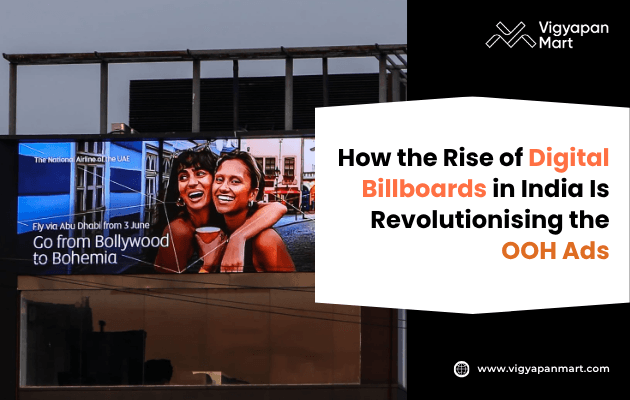 An outdoor billboard in an urban setting features two people joyfully embracing. The text highlights the impact of digital billboards on advertising in India.