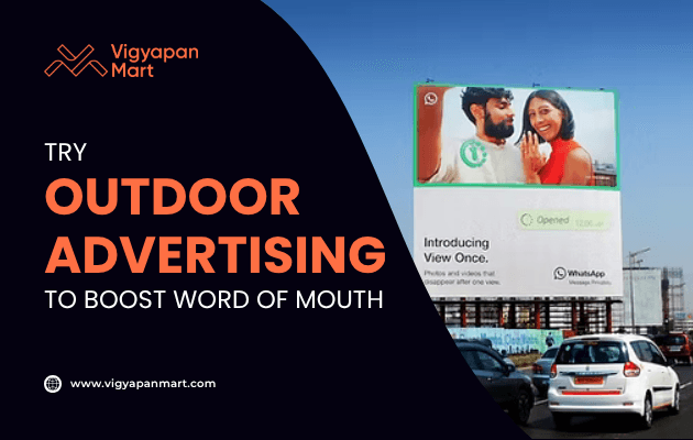 Large roadside billboard advertisement for WhatsApp promoting the “View Once” feature with an image of a smiling couple. Overlay text reads “Try Outdoor Advertising to Boost Word of Mouth” with Vigyapan Mart branding, emphasizing the impact of outdoor advertising on brand awareness.